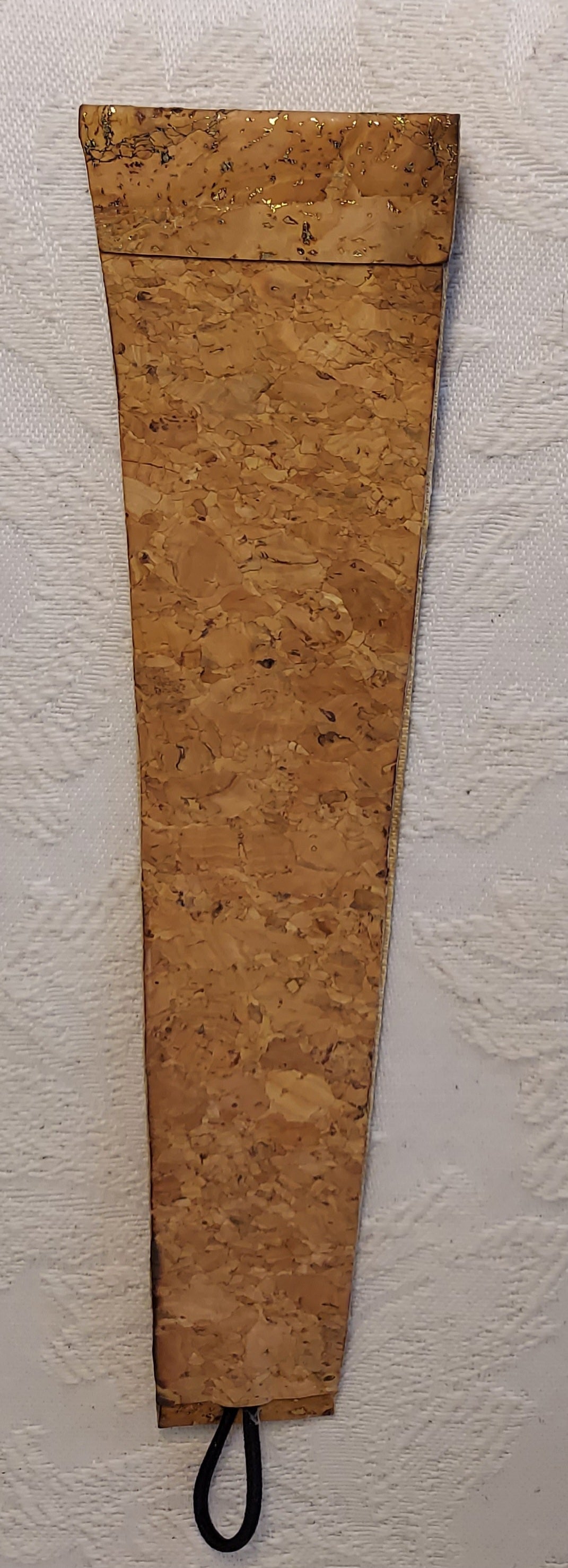 Back view of the natural cork bracelet, displaying its smooth cork surface and durable eco-friendly craftsmanship.
